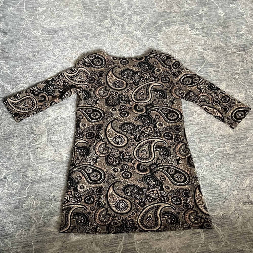 North style paisley color dress.
